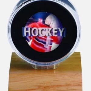 Hockey puck display with player image.