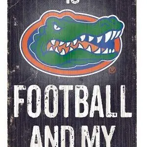 Gator logo, "All I need is football and my dog" sign.